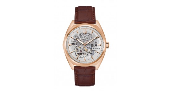 A rose gold Bulova skeleton watch with a brown leather strap, available at Huntington Fine Jewelers.