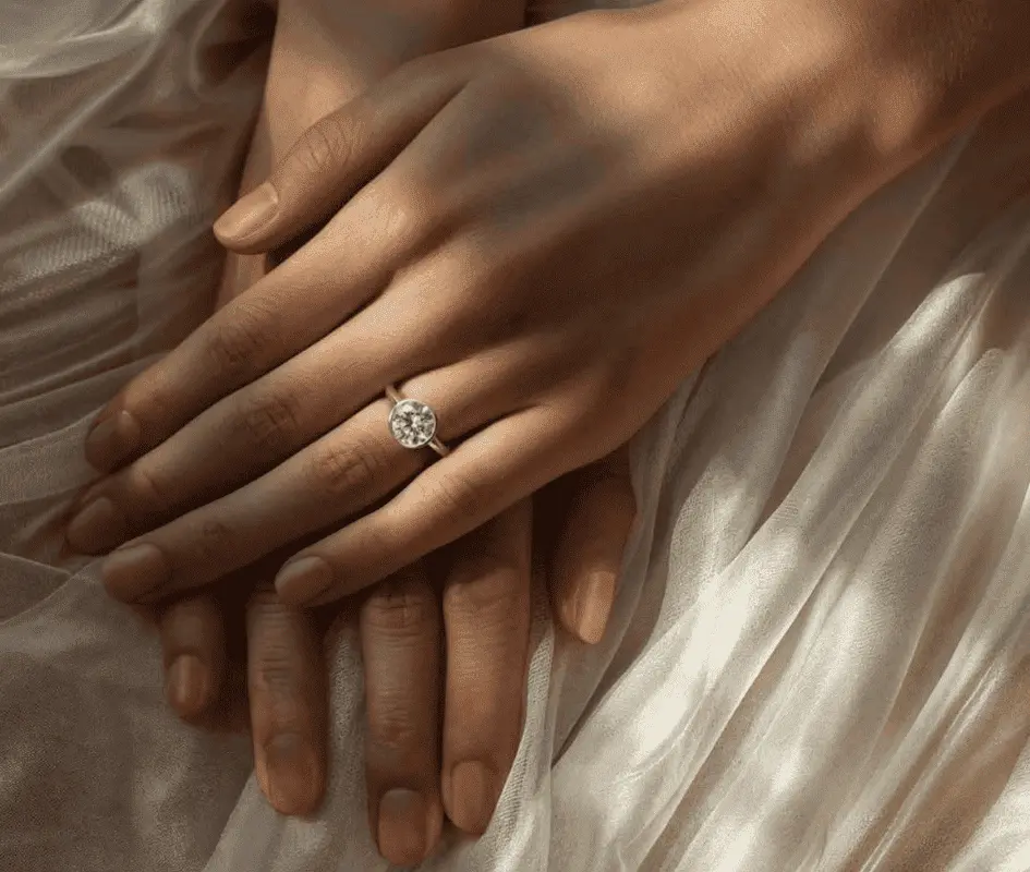 Two beautiful engagement rings stacked on top of each other