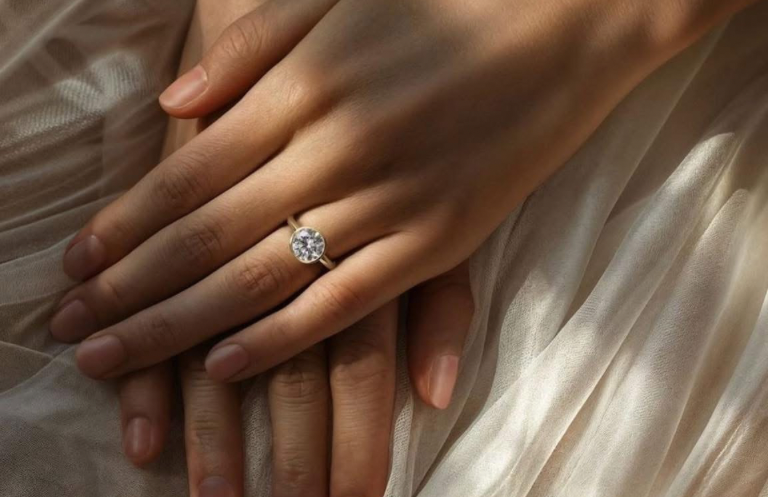 Two beautiful engagement rings stacked on top of each other