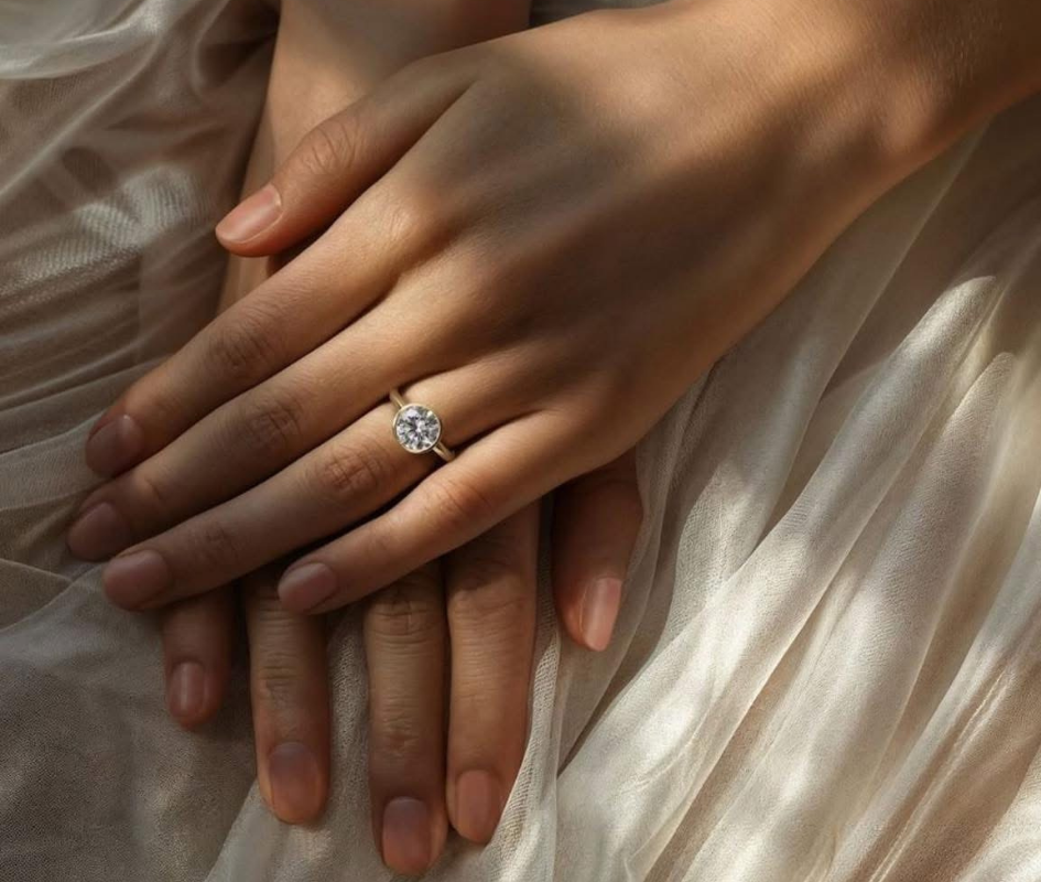 Two beautiful engagement rings stacked on top of each other