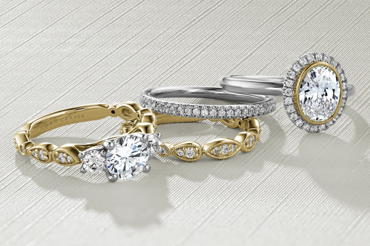 two diamond engagement rings and two wedding bands by Noam Carver two diamond engagement rings and two wedding bands by Noam Carver