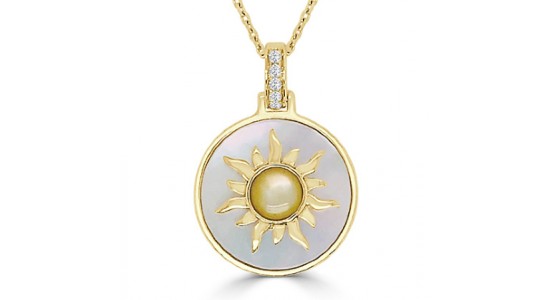 A yellow gold Frederic Sage pendant necklace with a sun motif and mother of pearl, available at Huntington Fine Jewelers.